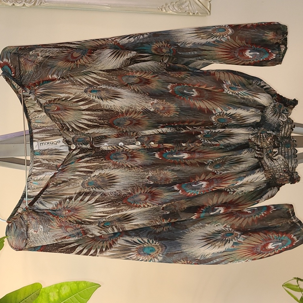 Blouse pikok top condition.by mixage